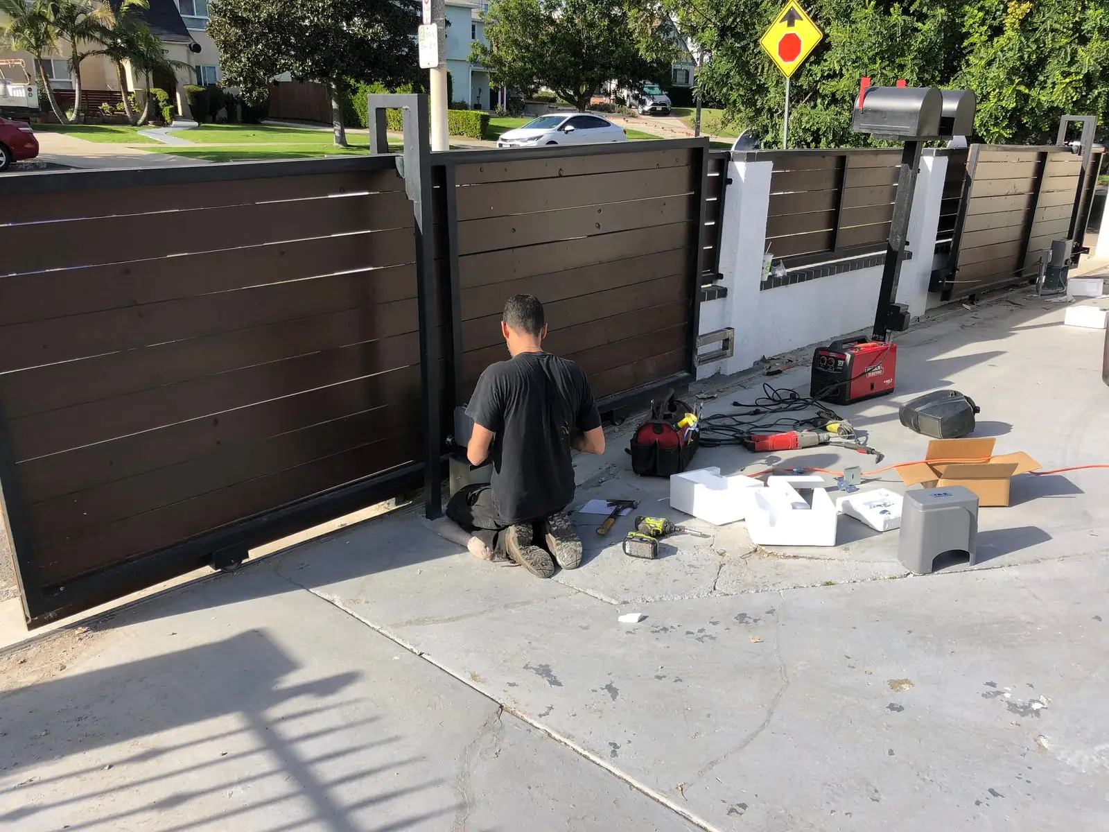 Installing a wood-look fence and slide gate