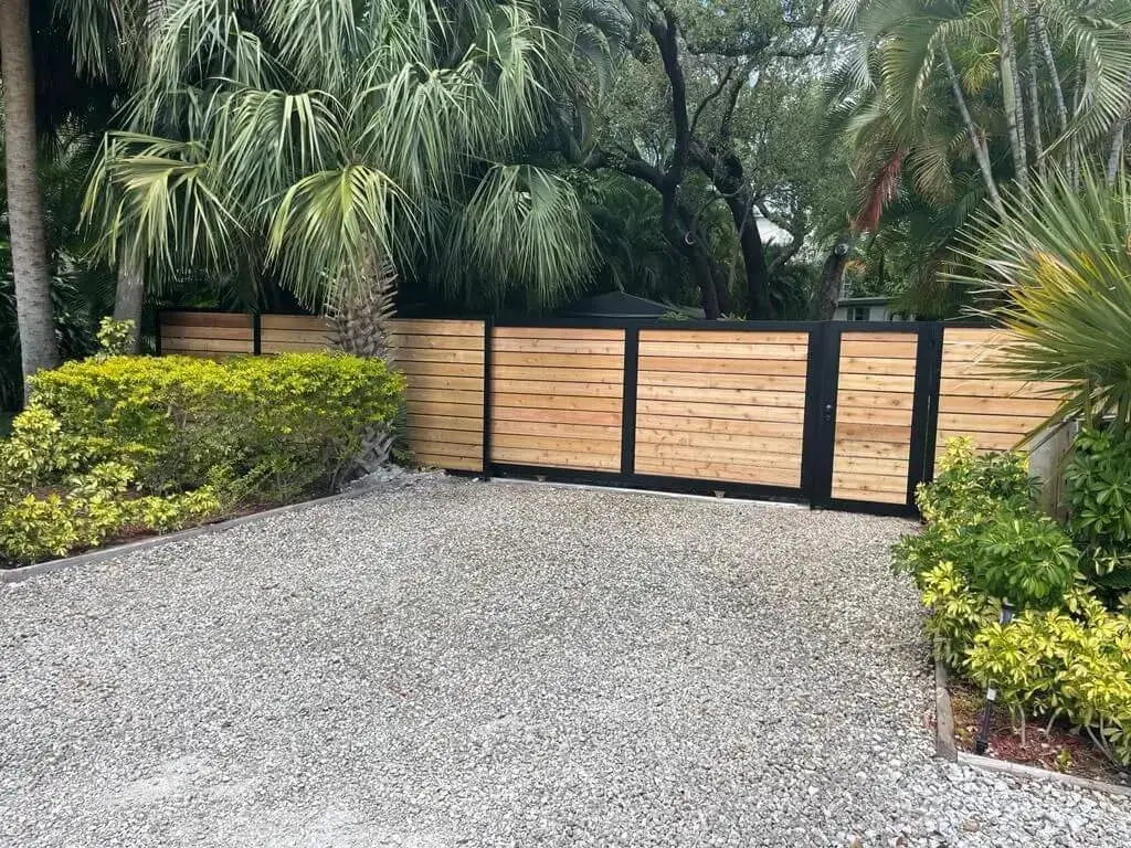 Wood and aluminum gate with fence